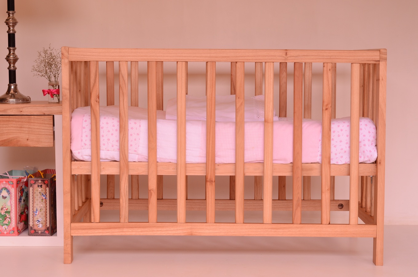 a brown baby crib